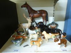 A collection of Beswick animal models including Red Rum on plinth,