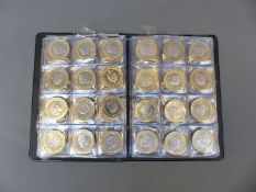 Schulz coin collector's book containing 84 collectable £2 coins including World War I,