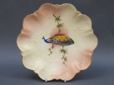 Locke & Co Worcester blush ivory cabinet plate decorated with a peacock signed H Wall,