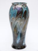 An iridescent glass vase,