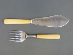 A pair of George V hallmarked silver ivory handled fish servers, Sheffield 1933, maker WB & S Ltd.