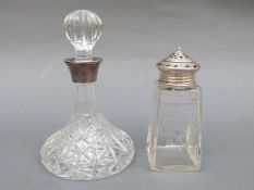 A modern hallmarked silver mounted cut glass miniature ship's decanter,
