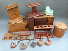 A collection of smoking related items including pipes,