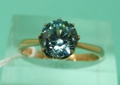 A 9ct gold ring set with a round cut zircon (size O)