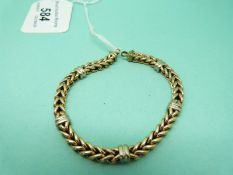 A yellow metal bracelet of plaited links (21.