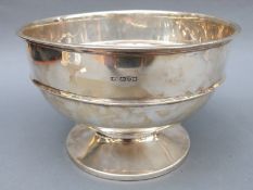 A large Edward VII hallmarked silver pedestal punch bowl, Chester 1909, maker's mark rubbed,