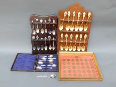 A quantity of collectors' spoons including hallmarked silver and white metal examples,