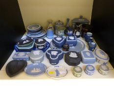 A large collection of Wedgwood Jasperware in a variety of colours including terracotta on black