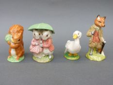Four Royal Albert figures comprising Squirrel Nutkin, Mr Toad,