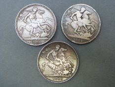 An 1821 George IIII crown together with an 1889 Victoria jubilee crown and a 1902 Edward VIII crown