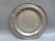 An 18thC pewter charger by Leapidge with London touch marks and marker's mark underside,