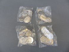 Four sealed bags of Squirrel Nutkin 50 pence uncirculated coins,