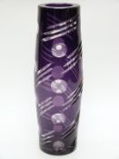 An amethyst flash overlaid cut glass vase of double tapering form, 30.