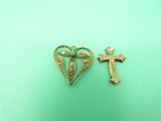 An Edwardian pendant set with seed pearls and a turquoise cabochon and a 9ct gold cross