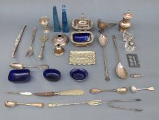 A Victorian hallmarked silver buckle, B'ham 1898, maker William Devenport, an Irish silver spoon,