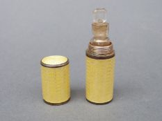 An early to mid 20thC hallmarked silver guilloche enamel scent bottle holder,