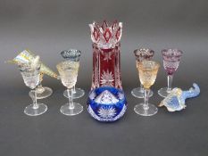 Eight pieces of flash overlaid cut glass including a set of six glasses together with two studio