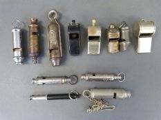 Twelve various whistles including Acme Scouts