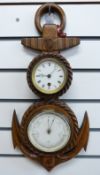 A late 19thC oak cased clock barometer carved in the form of a rope and anchor,