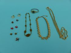 A collection of jewellery to include a beaded necklace, tiger's eye earrings,
