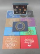 Nine Royal Mint Coinage of Great Britain and Northern Ireland sets including commemorative examples