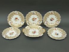 Five Chamberlains Worcester hand painted plates with floral and gilt decoration,