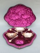 A cased set of three Victorian hallmarked silver two handled open salts,