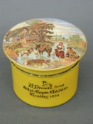 A 1924 British Empire Exhibition Prattware pot with lid