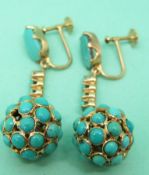 A pair of Victorian earrings set with turquoise carbochons