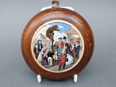 Prattware pot lid depicting a bear pit, 7.8cm in diameter, in turned wooden frame.