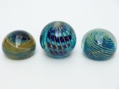 Three Mdina glass paperweights one signed by the artist to the base,