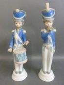 Two Lladro figures of a drummer and a bugle player