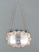 A modern hallmarked silver brandy bottle ticket or label,