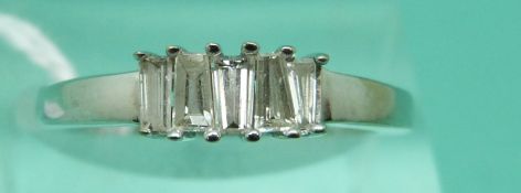 An 18ct white gold ring set with baguette cut diamonds (size L), weight 3.