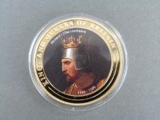 Nine Royal commemorative crowns, some embellished with gold plate, photographic etc 38mm diameter,