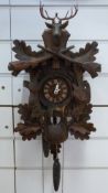 An early to mid 20thC Black Forest cuckoo clock,