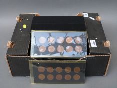 An amateur collection of early UK decimal mounted copper coins including 1/2p, 1p, and 2p examples,