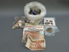 A quantity of sundry UK and overseas coinage including George II halfpennies,