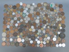 A collection of UK and overseas coinage to include Georgian and Victorian silver content,