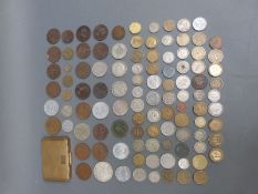 A small interesting collection of overseas and UK coinage, 19thC onwards to include silver content,
