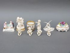 A collection of 19th/20thC ceramics including bisque cherub musicians, Dresden trinket,