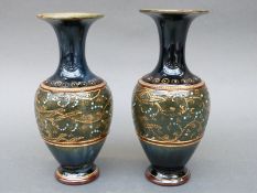 A pair of Royal Doulton Lambeth vases,