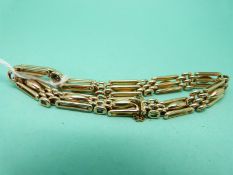 A 9ct gold Edwardian gate bracelet (16g)