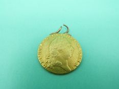 A 1795 gold spade guinea on hoop mount, 8.