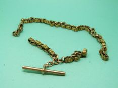 A Victorian 9ct gold watch chain with unusual pierced and textured links, 21.