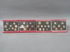 Four Royal Mint deluxe cased coin collections comprising 1988, 1989,