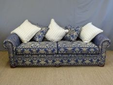 A large upholstered sofa, made in Worcester, original purchase price £5,000.