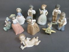 A collection of boxed Nao child figures