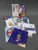 A collection of commemorative £5 coins,