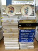 A consecutive run of 25 boxed Goebel Hummel annual plates,